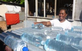 Kiribati is promoting a new solar water disinfection method involving heating  plastic water bottles on corrugated iron.