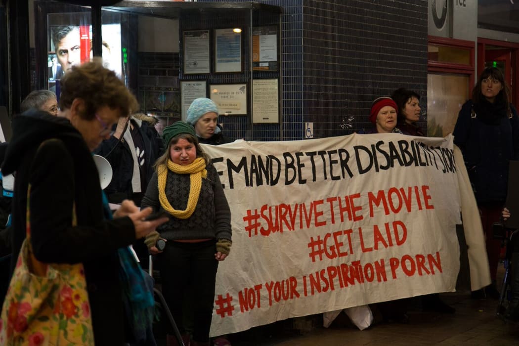 Esther Woodbury (middle) at the protest.