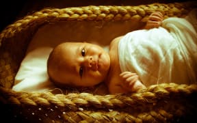 baby in sleeping pod