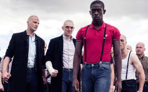 A still from the film "Farming" featuring Adewale Akinnuoye-Agbaje