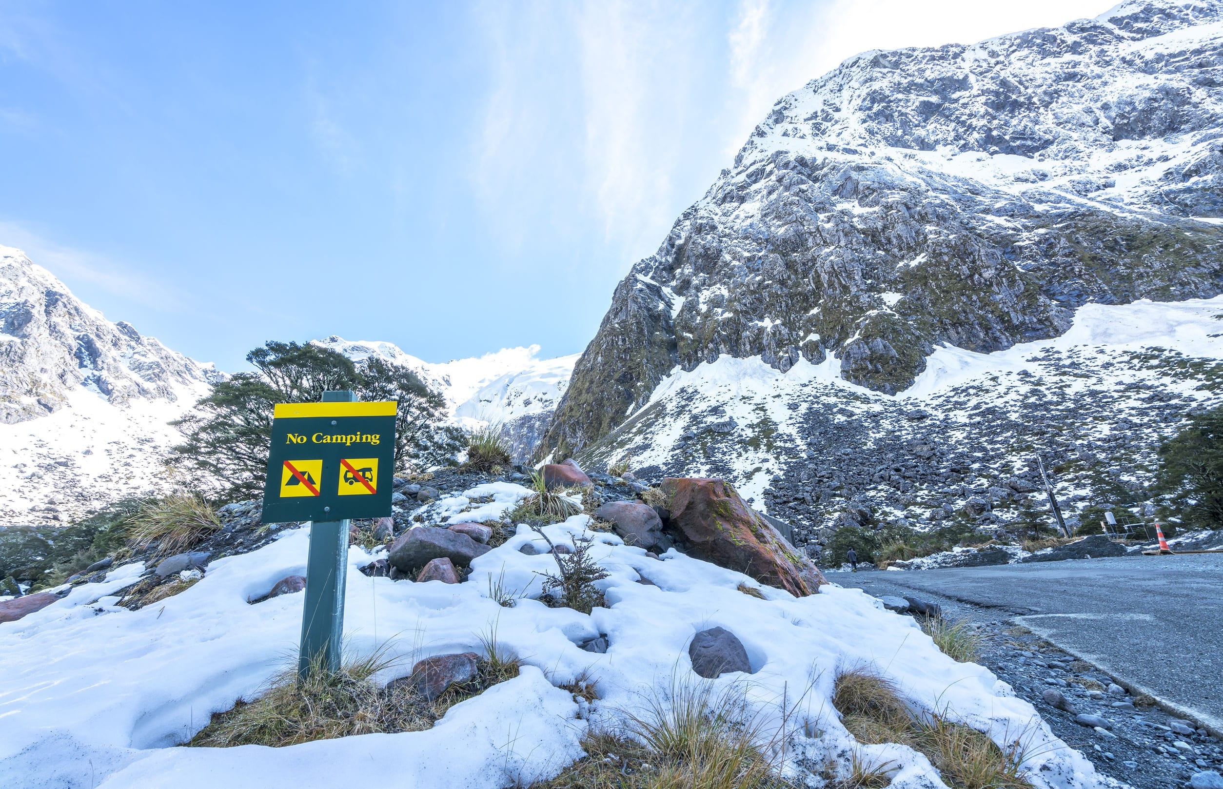 A no camping sign near Milford Sound entry, New Zealand.