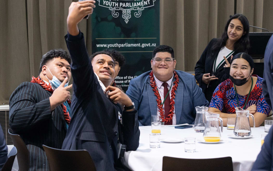 Youth MP Epeli Ole takes a selfie of his colleagues (from left) Trinity Kapeli,  Elijah Mareko (obscured), Fano Asiata, Kahurangi Katipa-Maikuku and Edna Fonua.