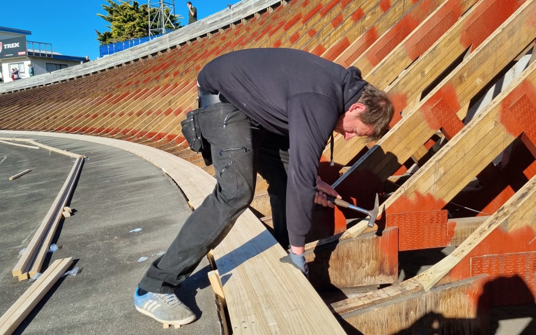 the new track is being hand nailed with about 300,000 nails. Laid end to end the accoya timber would stretch 75km.