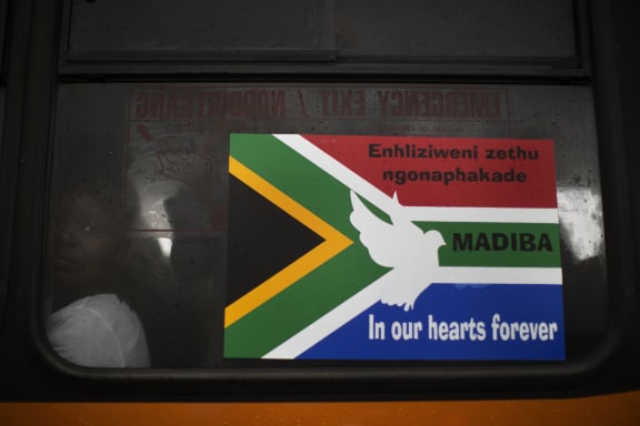 A sign on a bus leaving the service.