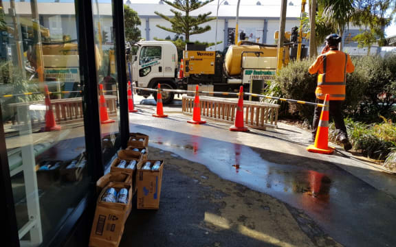 Workers at the site of the burst water main near the TSB Arena, Wellingtion.