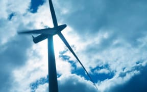 Low angle view of turbine on windfarm (Photo by Monty Rakusen / Cultura Creative / Cultura Creative via AFP)