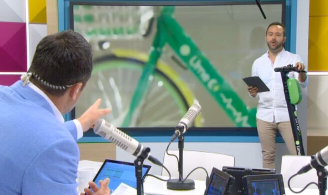 The AM show charges up the e-scooter debate.
