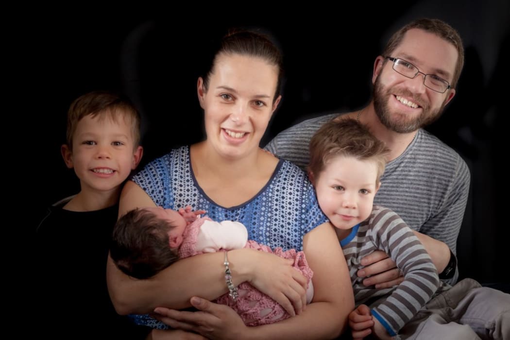 Carterton man Nick Perkins, who has recovered from MS after travelling to Singapore for treatment, with his family.