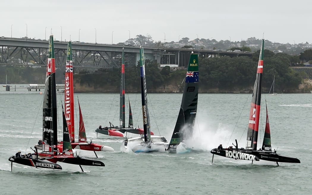 AUCKLAND, NEW ZEALAND - FEBRUARY 14: A collission between Black Foils driven by Peter Burling and Blair Tuke and DS Team France, driven by Quentin Delapierre at the start of race 3 during SailGP on February 14, 2026 in Auckland, New Zealand. (Photo by Phil Walter/Getty Images)