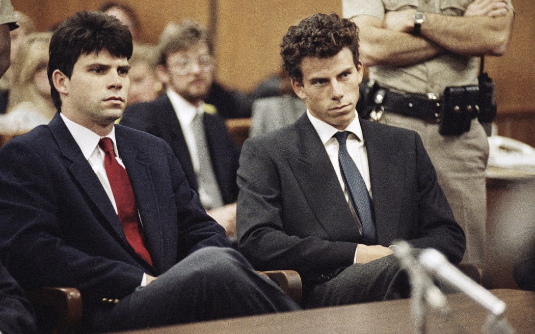 Lyle Menendez, left, and his brother, Erik, sit in Beverly Hills Municipal Court in Beverly Hills, California, on March 12, 1990.