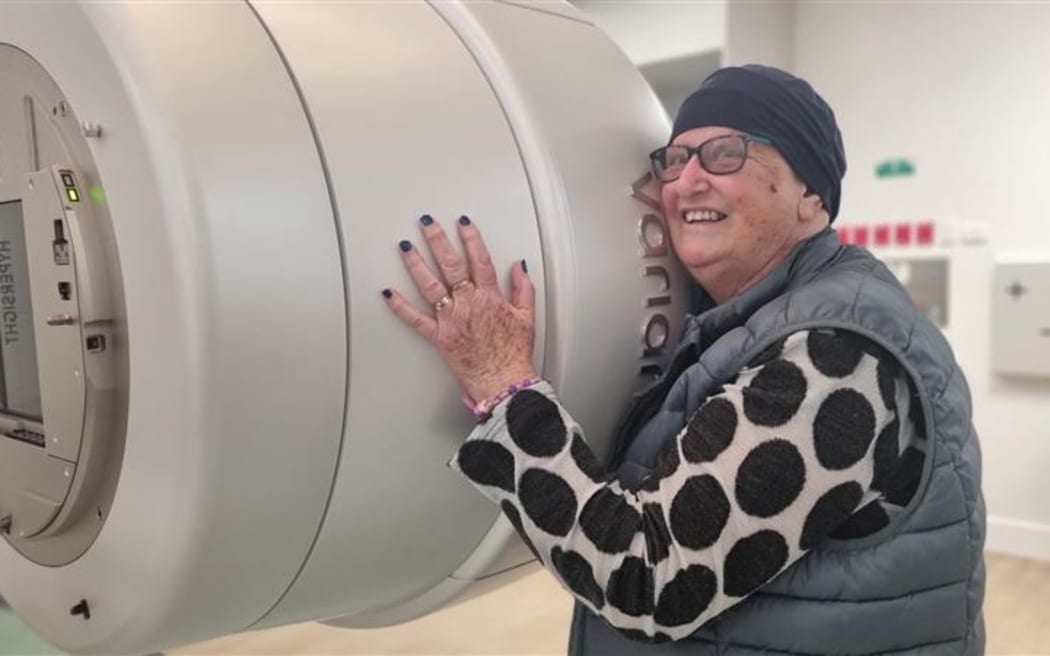 Christine Goldsworthy wanted to hug the LINAC radiation machine which means she'll no longer have to travel to Palmerston North for treatment.