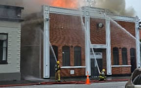 A total of eight crews of firefighters combated the blaze in the middle of the central Otago town, which destroyed the Roxburgh Town Hall, including its 128-year-old cinema.