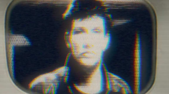 Graham Brazier still from the video for  Losing Heroes by The Bads