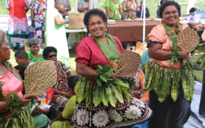Women of Vanua Levu entertain the visiting envoys.