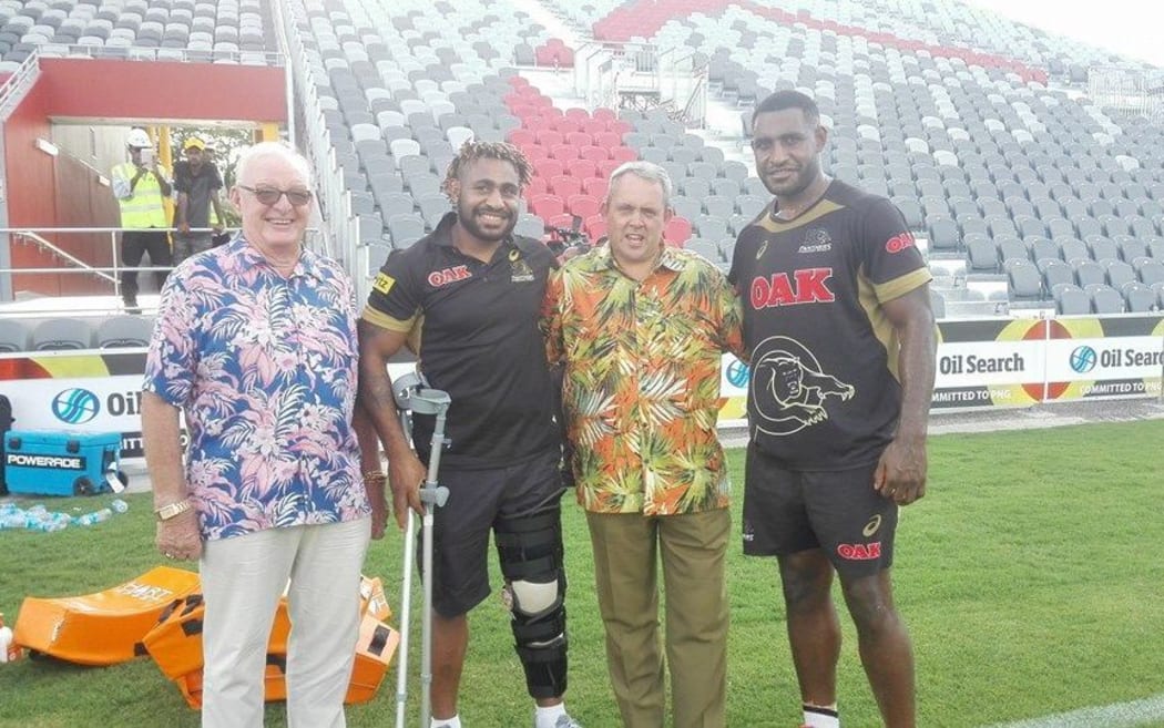 PNG Sports Minister Justin Tkatchenko with Penrith's Wellington and Stanton Albert.