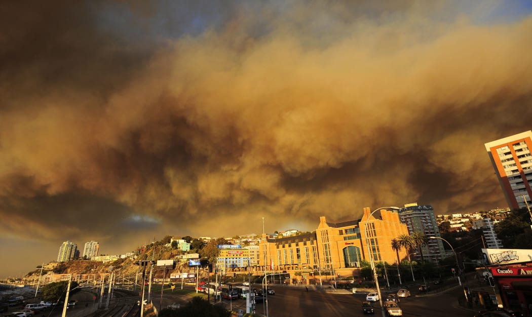 Smoke billows from the forest around Valparaiso, in Chile.