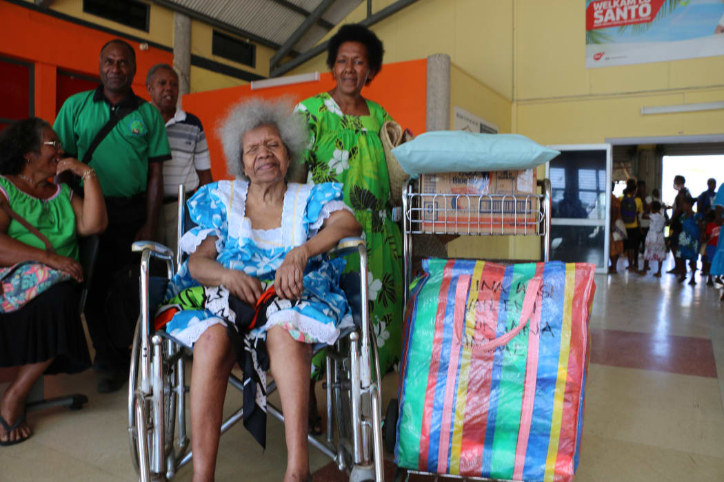 Clementine and her mother Lina (front) were airlifted from Ambae.