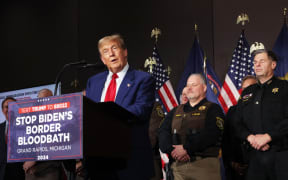 GRAND RAPIDS, MICHIGAN - APRIL 02: Former U.S. President Donald Trump speaks at a campaign event on April 02, 2024 in Grand Rapids, Michigan. Trump delivered a speech which his campaign has called "Biden's Border Bloodbath", as recent polls have shown that immigration and the situation at the U.S. Southern border continue to be top issues on voters' minds going into the November election.   Spencer Platt/Getty Images/AFP (Photo by SPENCER PLATT / GETTY IMAGES NORTH AMERICA / Getty Images via AFP)
