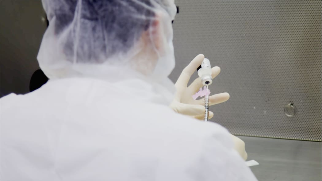 Photo dated December 9, 2020 courtesy of Mount Sinai Health System in New York shows a lab technician during a dry run at Mount Sinai hospital ahead of an expected Pfizer COVID-19 vaccine shipment over the weekend. -