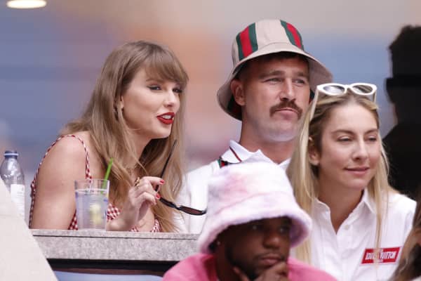 US singer-songwriter Taylor Swift (L) and boyfriend US NFL football player Travis Kelce attend the men's final match between USA's Taylor Fritz and Italy's Jannik Sinner on day fourteen of the US Open tennis tournament at the USTA Billie Jean King National Tennis Center in New York City, on September 8, 2024. (Photo by Kena Betancur / AFP)