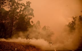 This NASA Earth Observatory handout image by Laura Dauphin taken on December 4, 2019, shows fires burning near the coast of New South Wales, near Canberra and areas north to the border with Queensland, Australia.