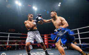 Fiji's Alivereti Kauyaca, left, lost on split points to New Zealand boxer John Parker in Hamilton. 13 September 2024