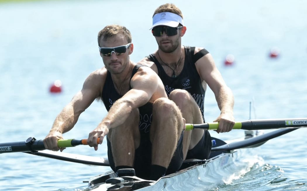 New Zealand's Daniel Williamson (R) and New Zealand's Phillip Wilson compete in the men's pair heats rowing competition at Vaires-sur-Marne Nautical Centre in Vaires-sur-Marne during the Paris 2024 Olympic Games on July 28, 2024. (Photo by Bertrand GUAY / AFP)