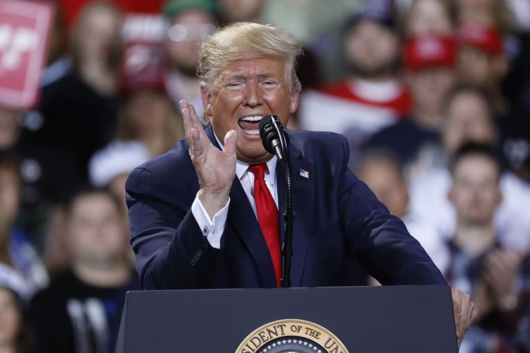 US President Donald Trump speaks during a "Keep America Great Rally" at Kellogg Arena December 18, 2019, in Battle Creek, Michigan.