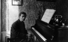 Portrait of Maurice Ravel (1875 - 1937) at the piano.