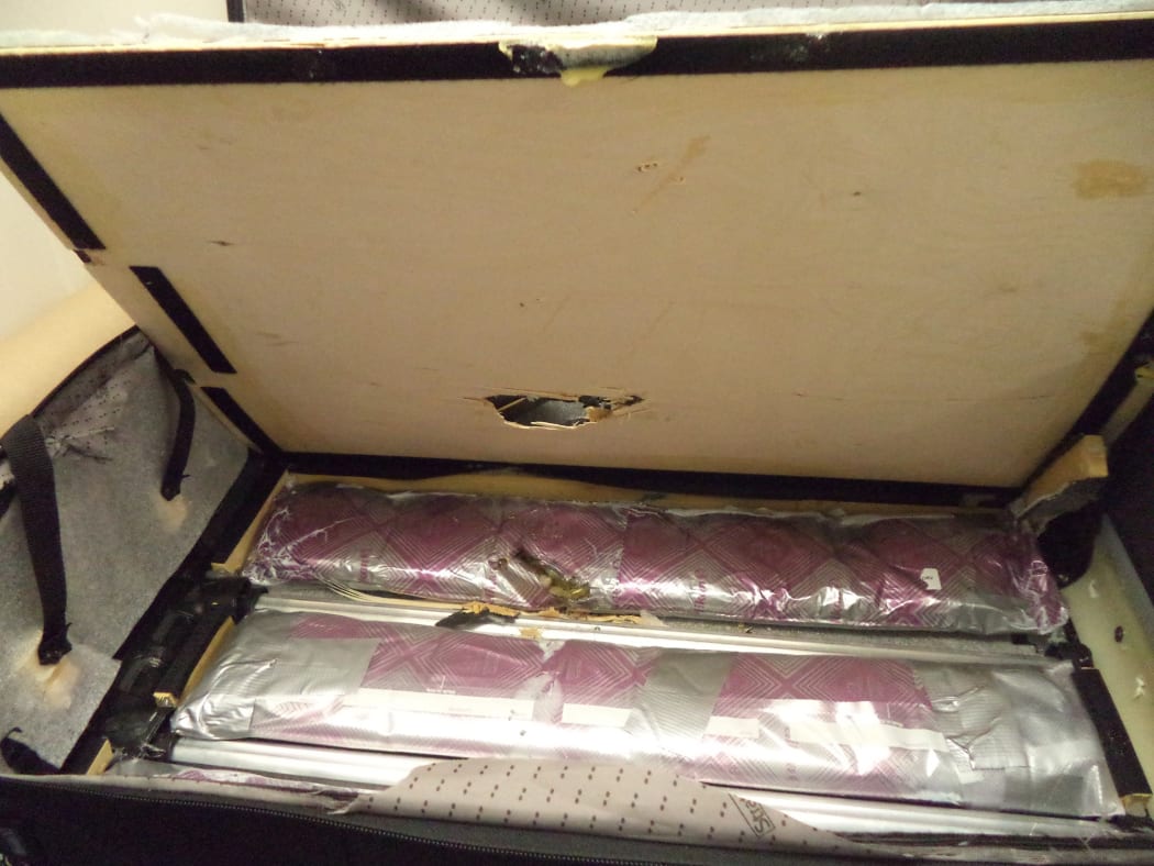 Three people have been arrested for trying to smuggle up to $5m of MDMA through Auckland Airport.