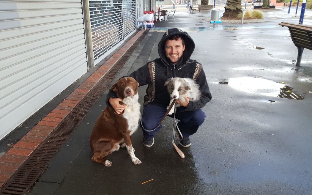 Hayden O'Brien, with dogs Kingston and Tricksy, says he doesn't believe the rule change will reduce the number of dog attacks.