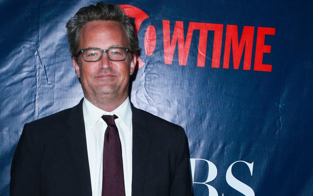 (FILE) Matthew Perry Dead At 54. Matthew Perry has died. He was 54. The actor, who was best known for playing Chandler Bing on 'Friends', was found dead at a Los Angeles-area home on Saturday, October 28, 2023. WEST HOLLYWOOD, LOS ANGELES, CALIFORNIA, USA - AUGUST 10: American-Canadian actor, comedian and producer Matthew Perry (Matthew Langford Perry) arrives at the CBS, CW And Showtime 2015 Summer TCA Party held at the Pacific Design Center on August 10, 2015 in West Hollywood, Los Angeles, California, United States. (Photo by David Acosta/Image Press Agency/NurPhoto) (Photo by Image Press Agency / NurPhoto / NurPhoto via AFP)