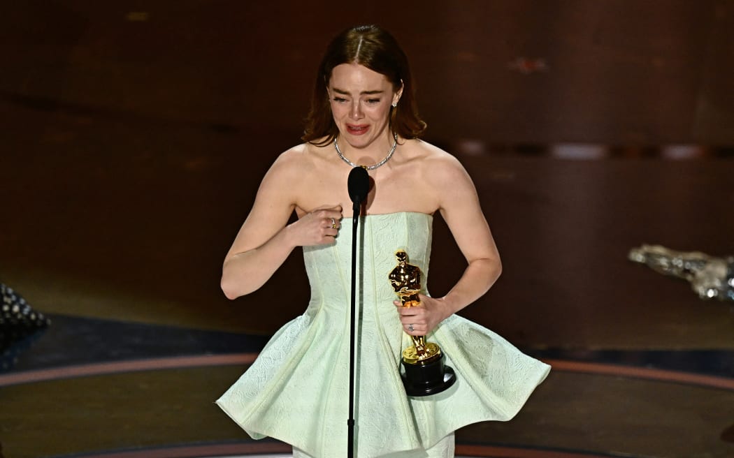 US actress Emma Stone accepts the award for Best Actress in a Leading Role for "Poor Things" onstage during the 96th Annual Academy Awards at the Dolby Theatre in Hollywood, California on March 10, 2024. (Photo by Patrick T. Fallon / AFP)