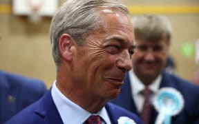 Reform UK leader Nigel Farage reacts after being elected to become MP for Clacton at the Clacton count centre in Clacton-on-Sea, eastern England, early on 5 July, 2024.
