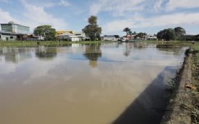 Taruheru river almost overflowing through Gisborne, 24 March 2022.