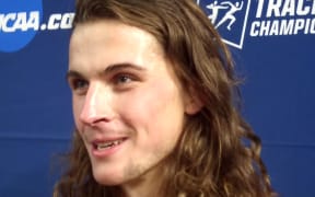 NCAA mile winner Geordie Beamish speaks to media after the race.