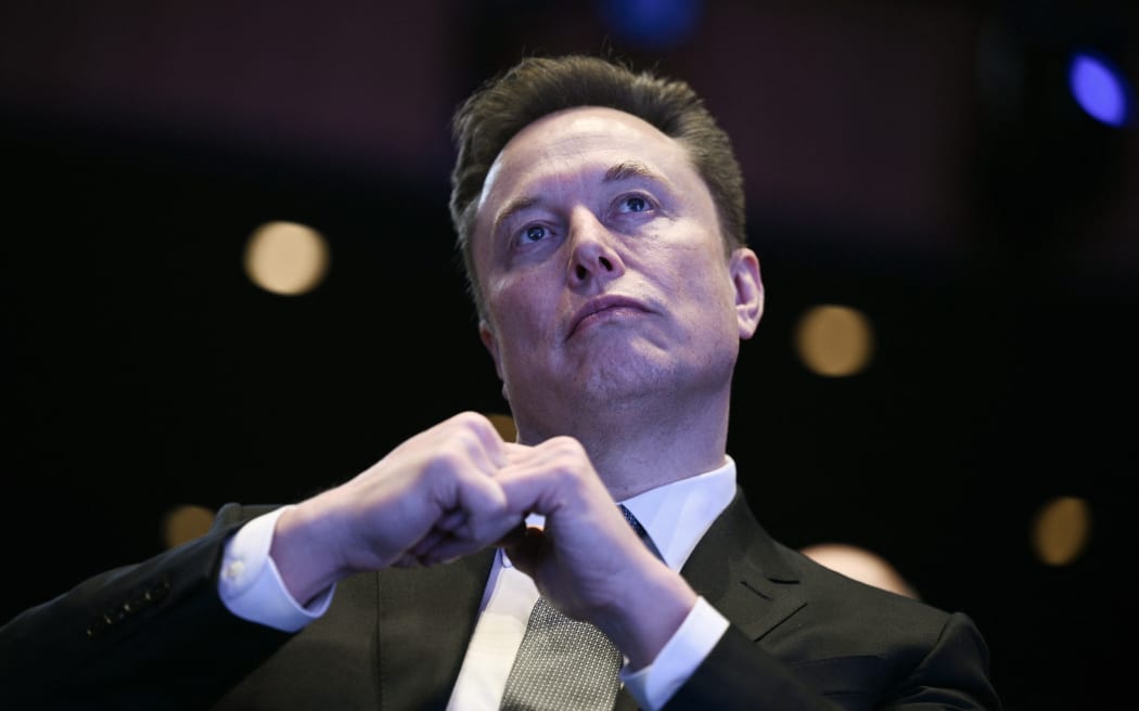Elon Musk looks on as US President Donald Trump speaks at the US-Saudi Investment Forum at the John F. Kennedy Center for the Performing Arts in Washington, DC on November 19, 2025. (Photo by Brendan SMIALOWSKI / AFP)