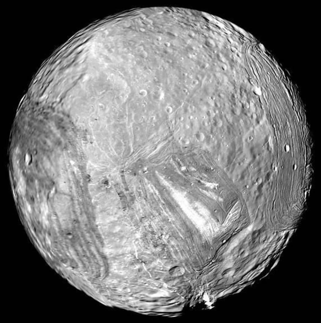 Uranus' icy moon Miranda is seen in this image from Voyager 2 on 24 January, 1986.