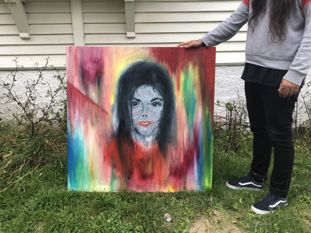 Roy Irwin with his unique painting of Michael Jackson.
