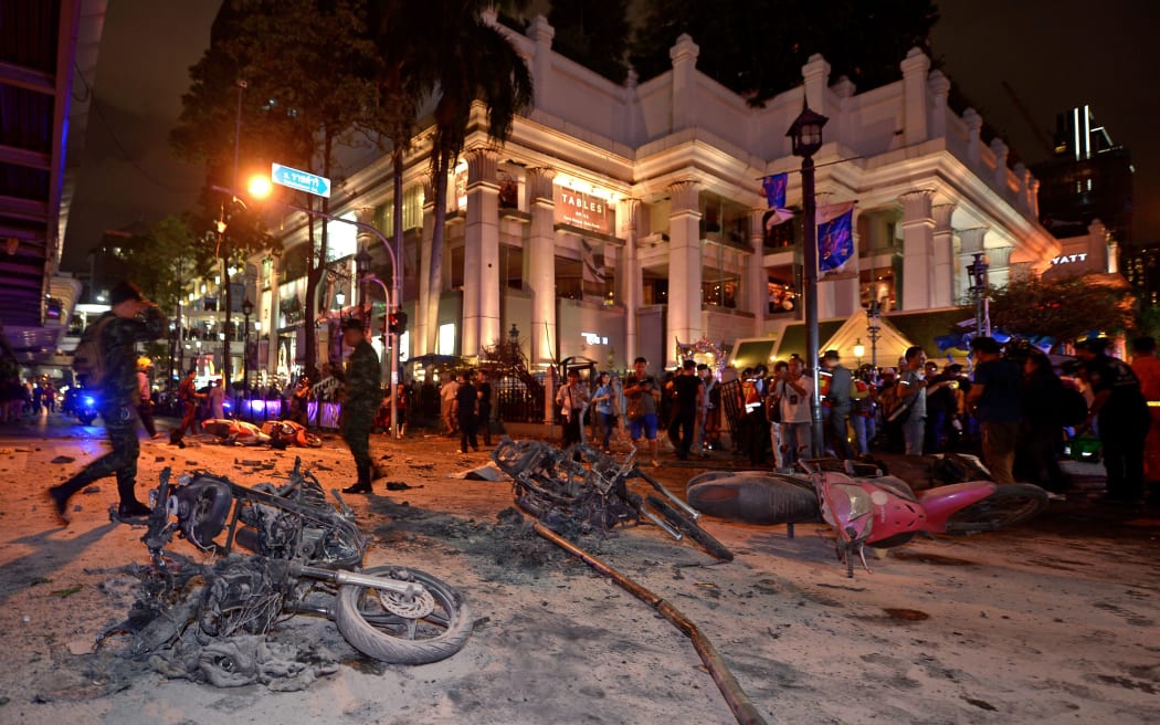 Thai soldiers inspect the scene after a bomb exploded outside a religious shrine in central Bangkok late on August 17, 2015