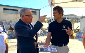French minister for Overseas François-Noël Buffet meets business leader Nicolas Guesdon, whose hardware company was completely looted and destroyed by fire in May 2024 – PHOTO RRB