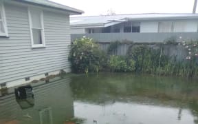 Human waste regularly flooded gardens in Masterton's Cockburn St during and after heavy rain.