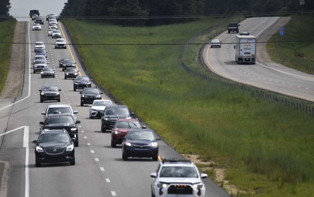 Residents drive north (L) on Interstate Highway 55 near Magnolia, Mississippi, as they evacuate away from New Orleans on August 28, 2021, before the arrival of Hurricane Ida.
