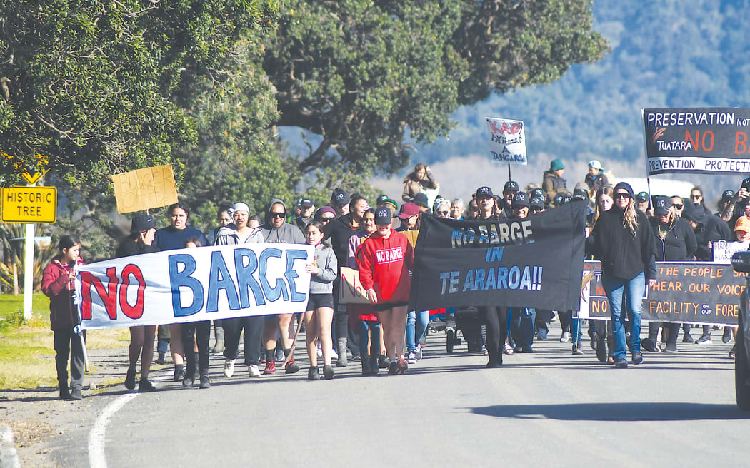 Tuatara Group, a collective of ahi ka and long term residents of Te Araroa, march against proposed Barge development in Te Araroa