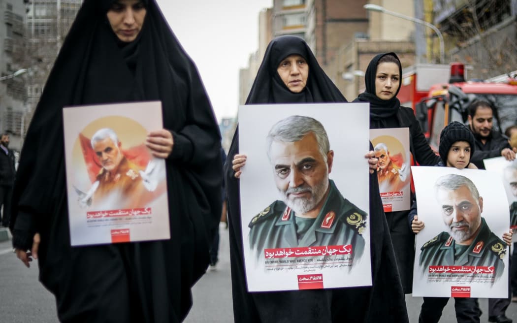 Iranians take part in an anti-US rally to protest the killings during a US air strike of Iranian military commander Qasem Soleimani and Iraqi paramilitary chief Abu Mahdi al-Muhandis on January 4, 2020 in Tehran, Iran.