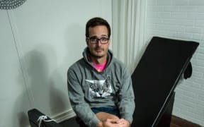 Tickled co-director David Farrier sitting on a purpose-built tickle chair
