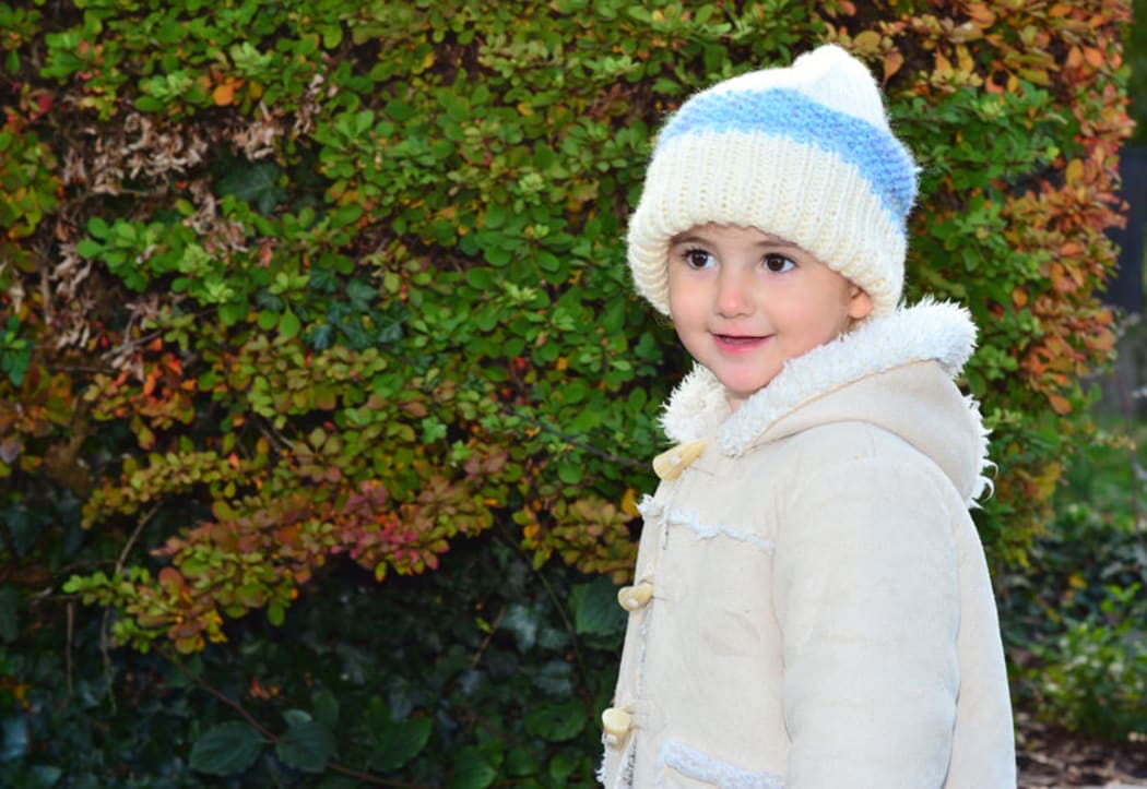 Child in woollen hat