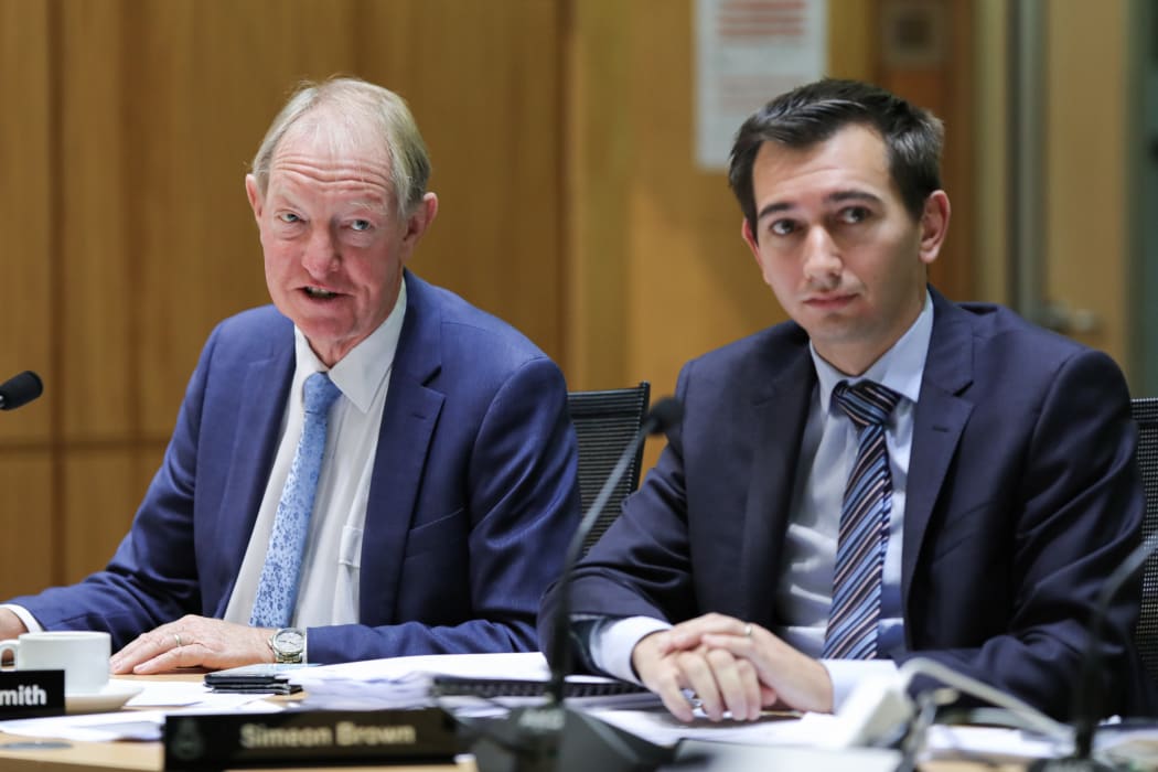 National MP Nick Smith ask a question in Committee alongside Simeon Brown