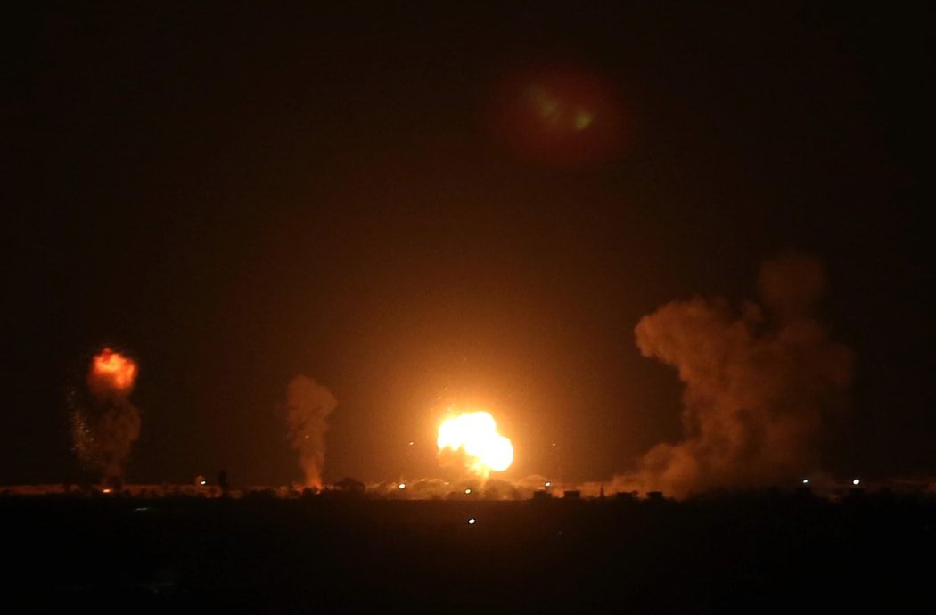 Explosion illuminates the night sky after Israeli warplanes hit several targets of Izz ad-Din al Qassam Brigades on September 16, 2020 in Khan Yunis, Gaza.