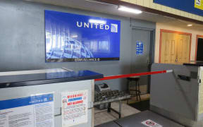 The United Airlines check in area at Amata Kabua International Airport in Majuro: the airline recently vacated its office behind the check in area due to safety hazards and a just-discovered two-year-old engineering report confirms the main terminal roof poses a danger of collapse.